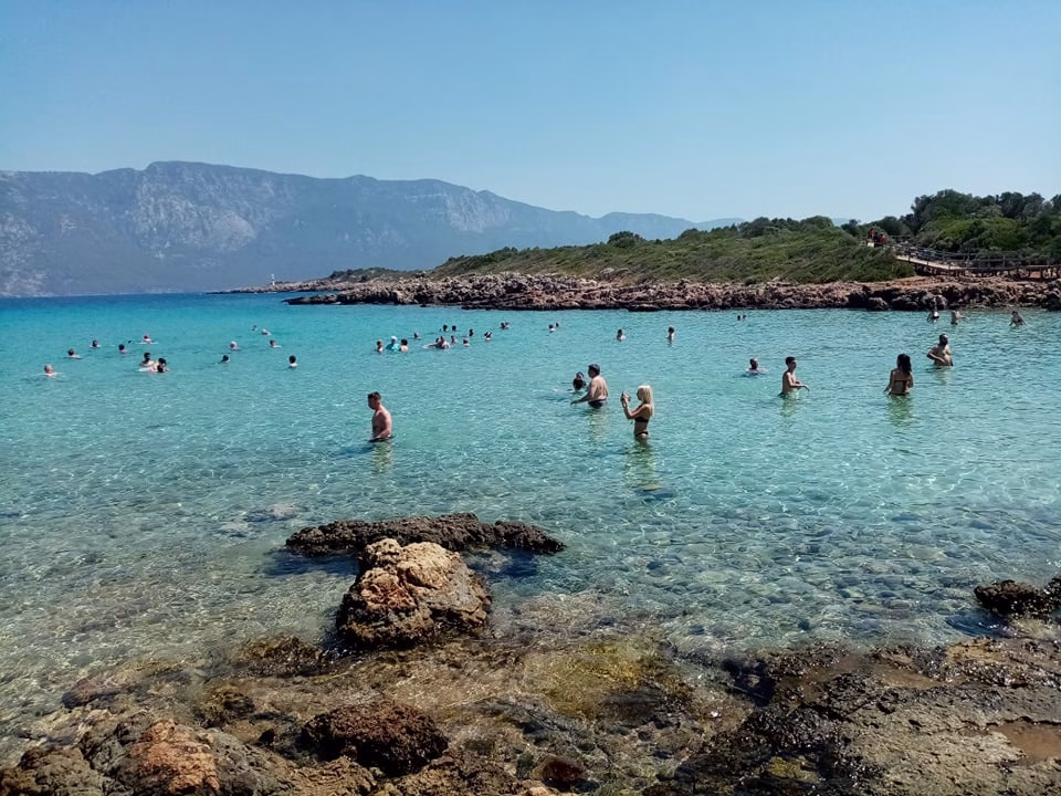 People swimming Marmaris Travel Time Agency